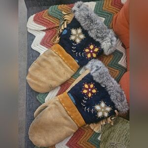 Indigenous handcrafted leather and fur mittens with floral beadwork. Gauntlets.